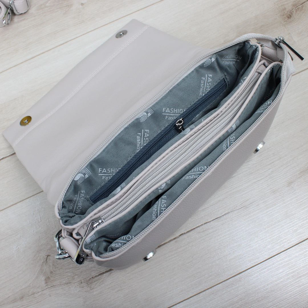 Жіноча сумка крос-боді беж для ділових леді: елегантність та функціональність